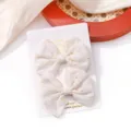 Elegant white floral embroidery bow hair clips for kids with handmade display card - Floral Embroidered Bow (8)