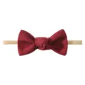 Soft and stretchy baby bow headband in a deep burgundy red color for infants and toddlers - Dark Red