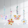 Assorted crystal suncatchers with butterfly and flower designs creating rainbow prisms. - 2 Flowers And 2 Butterflies Style / 4 Pieces