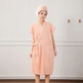 Comfortable coral fleece wearable bath towel and bathrobe set in soft pink for daily home use. - Bubble Fleece Bathrobes (One Size) / Pink