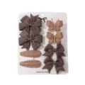 Set of 8 children's hair clips featuring brown ribbon bows and knitted butterflies on white card - Brown