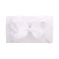 Premium soft white nylon baby headband with a decorative large ribbon bow hair accessory - White