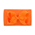 Vibrant orange nylon baby headband featuring a soft grosgrain ribbon bow detail - Tangerine Orange
