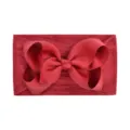 Elastic soft red nylon infant headband featuring a large ribbed bow hair accessory - Burgundy