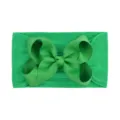 Soft elastic green nylon baby headband featuring a large grosgrain ribbon bow accessory - Grass Green