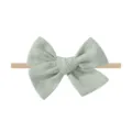 Zachte lichtgroene baby nylon elastische haarband met een grote linnen textuur strik - Light Green (2998-21)