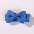 Mini royal blue bow hair clip for girls featuring a classic ribbed ribbon texture and design - Royal Blue (350)