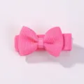Mini pink grosgrain ribbon bow hair clip for little girls featuring solid candy color - Hot Pink
