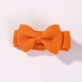 Small orange grosgrain ribbon bow hair clip for girls, candy color mini hair accessory - Orange