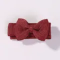Small burgundy ribbed ribbon bow hair clip for children's side fringe styling. - Dark Red
