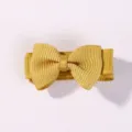 Small yellow grosgrain ribbon bow hair clip for girls, cute candy colored mini accessory - Candy Yellow