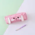 Close-up detail of the cute pink canvas pencil pouch featuring 3D bunny ears and sweet face. - Pink