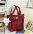 Red canvas tote bag with cute star and mushroom print, large capacity shoulder bag for students. - Tote Bag Red + Pendant