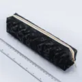Fashionable black quilted pencil case with zipper, large capacity student stationery storage bag. - Black