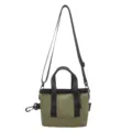 Compact olive green tote bag with black contrast straps and adjustable shoulder strap - Army Green