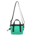 Front view of a small green nylon crossbody bag with black handles and shoulder strap - Turquoise Green