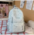 Light blue star print student backpack with multiple compartments for daily school use. - Large Without Pendant / Blue