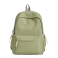 Vue de face du sac à dos décontracté vert menthe avec grande poche avant et détail de poignée - L / Vert
