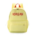 Vue frontale d'un sac à dos étudiant jaune léger avec broderie rouge - L / Jaune
