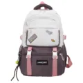 Front detail of a color-block school backpack with cute patches and tennis keychain - Without Pendant / Purple