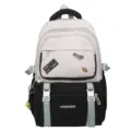 Detailed view of color-contrast student backpack featuring cute patches and durable straps - Without Pendant / Black