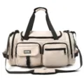 Frontal view of a beige sports duffel bag showing its multiple pockets and strap. - Khaki