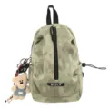 Detailed view of tie-dye canvas messenger bag with a cute bear charm - Green Tie-Dye (With Bear Pendant) / One Size