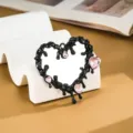 Dettaglio di un adesivo per telefono a forma di cuore liquido Y2k con cristalli rosa - Nero