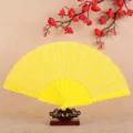 Solid color classic plastic folding fan women summer dance fan decorative display fan - Yellow