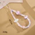 Close-up of a handmade purple and white beaded phone strap with 18.7cm length - Cloud Hand-painted Beaded Style (K6503) / Purple