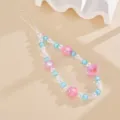 Detailed view of summer handmade beaded phone strap with pink heart and blue beads - Double Layer Heart Flower Style (K6505) / Pink