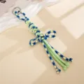 Detail des handgefertigten zweifarbigen Schlüsselanhängers aus geflochtenem Nylon - Vajra Knoten Zweifarbiger Geflochtener Anhänger (K6349) / Grün