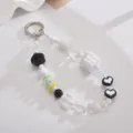 Detalle de un lindo colgante para móvil de cuentas con motivos de caja de regalo y conejo. - Estilo Doble Corazón + Caja de Regalo Blanco