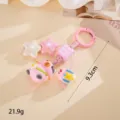 Detail of pink otter keychain with stars and painted beads, length 9.3cm, 21.9g. - Pink Guinea Pig Checkered Pendant (K6315) / Pink