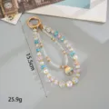Detailed view of colorful double-layer crystal pearl charm with floral pendant - Enamel Flower Pendant (K6587) / Blue