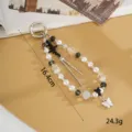 Λεπτομέρεια κρεμαστού κινητού με χάντρες, πεταλούδα και σχέδιο σε σχήμα καρδιακού παλμού - Μενταγιόν Ηλεκτροκαρδιογράφημα + Πεταλούδα Μαύρο(K6595)
