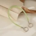 Detail view of luxury mint green rhinestone mesh rope phone strap with silver double clasps. - Green Mesh Rhinestone Chain (K6577)