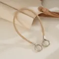 Close-up of sparkling champagne gold rhinestone mesh phone wrist strap with double clasps. - Champagne Mesh Rhinestone Chain (K6578)