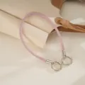 Detail of pink sparkling mesh strap with silver clasps on a beige leather bag background - Pink Mesh Rhinestone Chain (K6580)