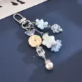 Detailansicht des sommerlichen Sternflaschen- und Blumen-Taschenanhängers mit Perle - Anhänger (K6532) / Keks Und Sternflasche Anhänger Blau