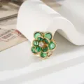 Dettaglio charm camelia in cristallo verde per decorazione fai-da-te cover e scarpe - Verde