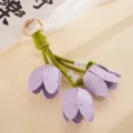 Eleganter handgefertigter lila Tulpen-Taschenanhänger aus PU-Leder mit Goldverschluss - 郁金香皮革挂件(K6355)