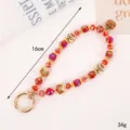 Handmade red crystal beaded phone wrist strap with traditional lion dance charms - Lion Dance Beast Charm / 16cm/34g / Red Purple (K5723)