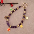 Purple beaded phone wrist strap with colorful enameled eye charms and gold hardware. - Five-Route Wealth God Pendant Charm / Purple (K5724)