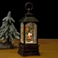 Lanterne globe de neige de Noël vintage avec figurine de Père Noël et lumières LED. - Père Noël Lampadaire