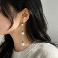 Eleganti orecchini lunghi con perle d'acqua dolce e perline di cristallo verde per donna. - Stile Nappa in Pietra Tagliata Verde (E2731)