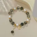 Elegantes Armband aus grünem Naturkristall und Perlen mit filigranem Sternanhänger Detail. - Süßwasserperle Schwarzer Rutilquarz (B4239)