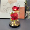 Enchanted glass dome red rose with LED fairy lights, perfect romantic gift and decor. - Red