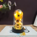 Graduation gift sunflower preserved flower night light with cute bachelor doll detail view. - Graduate Boy Style
