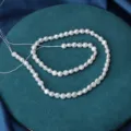 Natural white flat coin pearl loose beads for DIY jewelry making, smooth and lustrous. - 5-5.5mm